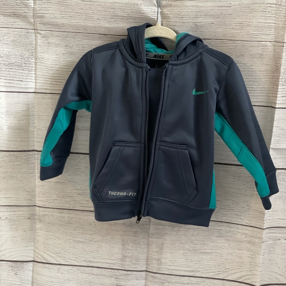 2 piece Nike track suit. In Blue. Size 12 months.